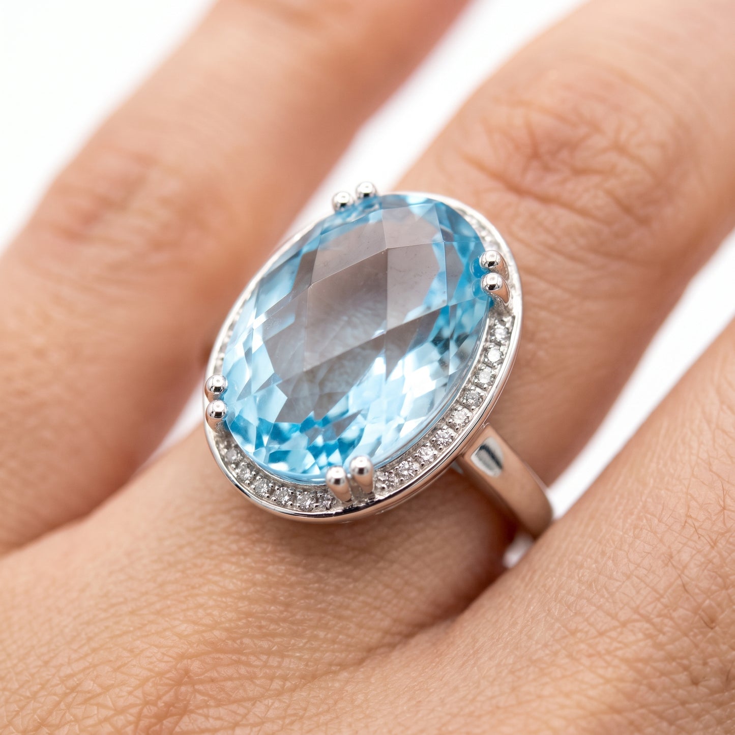 10x15mm Checkerboard-Cut Oval Sky Blue Topaz & 26-Diamond Ring
