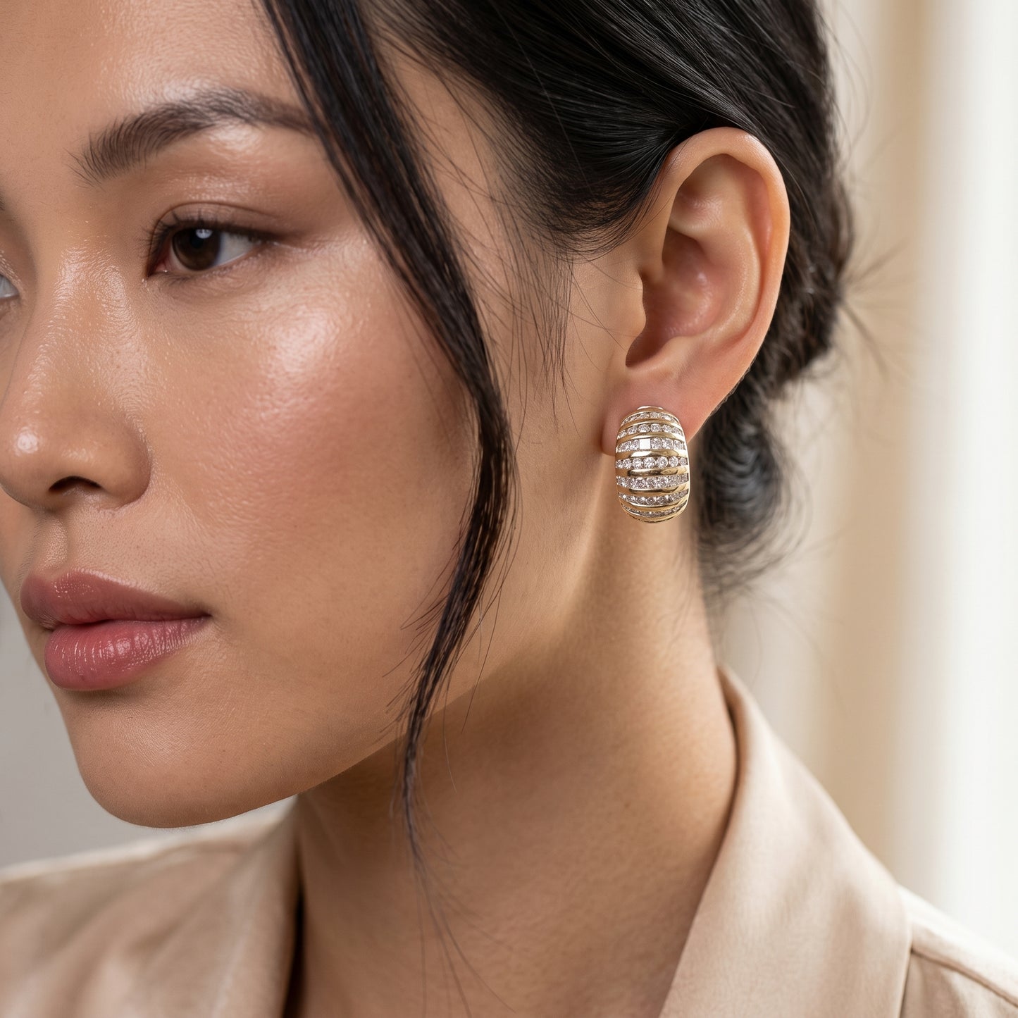 4.17 Carat Round and Baguette Diamond Domed Clip Earrings — worn on model