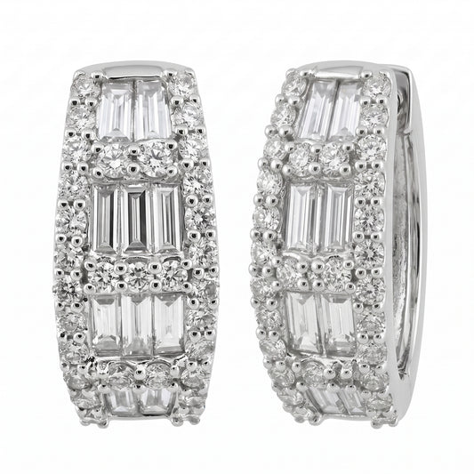 18K white gold baguette and round diamond huggie hoop earrings, angled view showing the hinge and plain inner band, on a white background