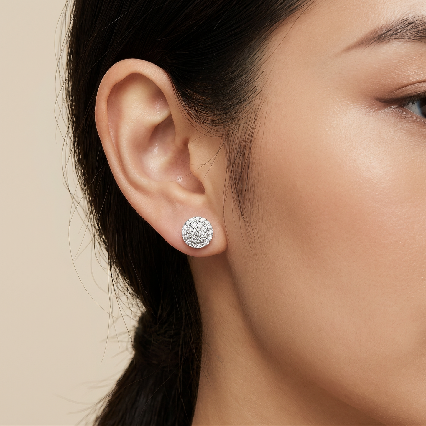 50-Diamond Round Stud Earrings, 9mm - 18K white gold round halo cluster diamond stud earrings shown worn on the ear