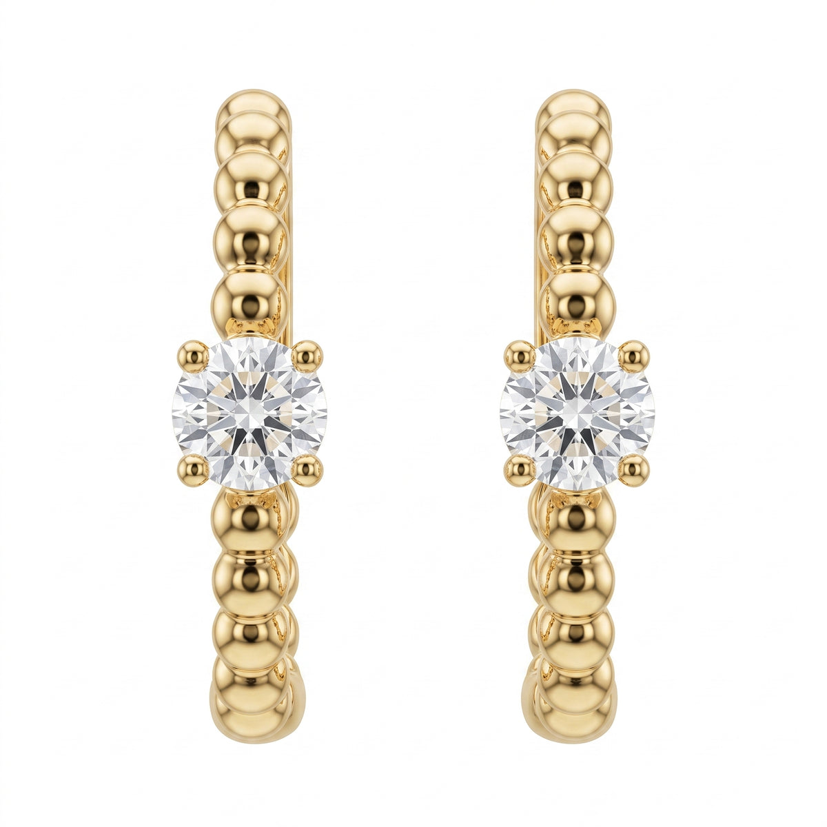 DERT0920YW-RD W-1 white background pair view - 14k yellow gold beaded hoop earrings with one round diamond each