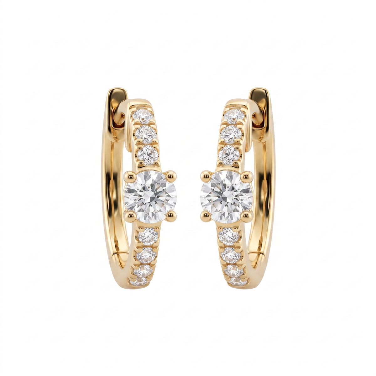 DERT0954 14K yellow gold hinged huggie hoop earrings with round brilliant centre stone and seven-diamond graduated row, front view
