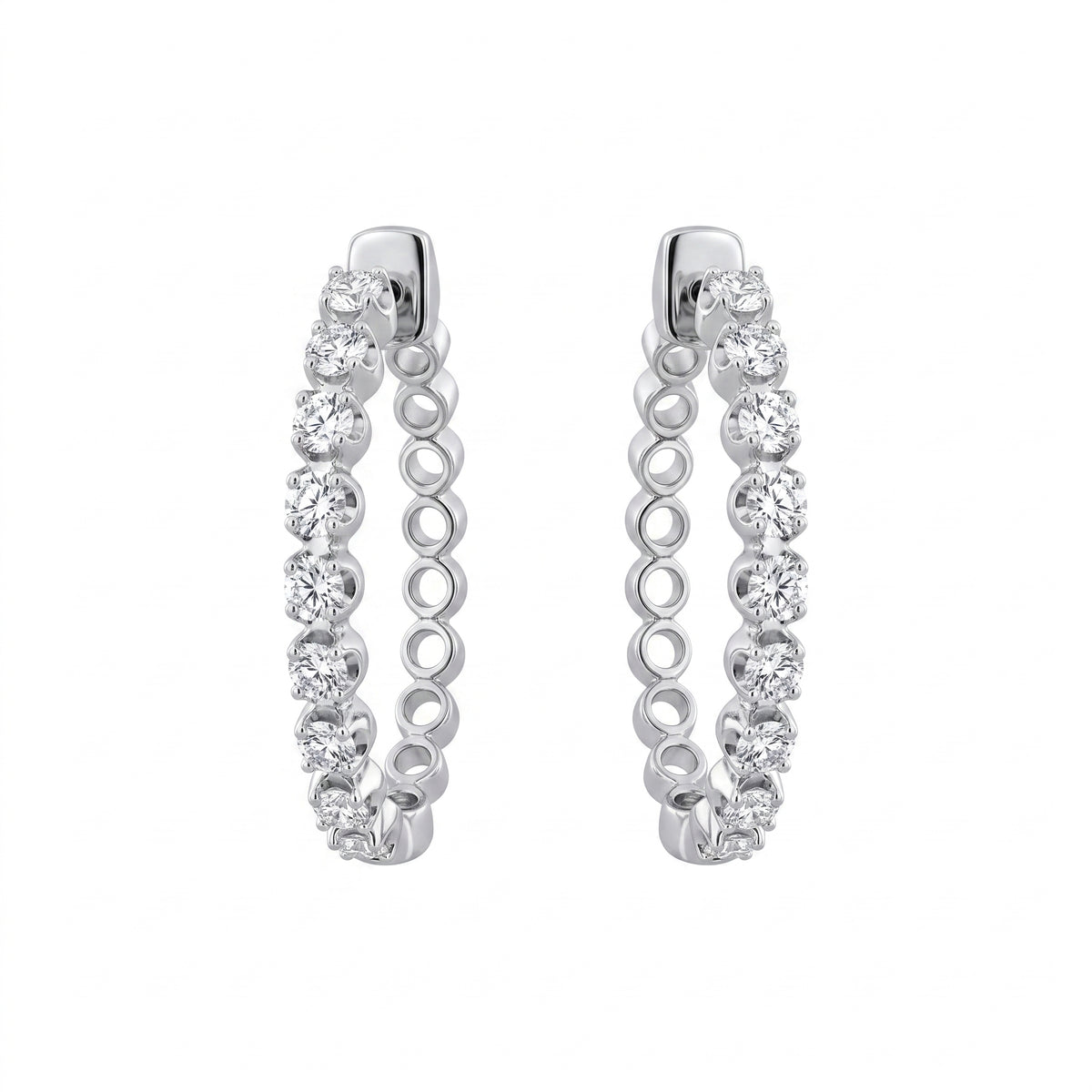 16-Diamond Oval Hoop Clip Earrings - 18k white gold oval hoops prong-set with a single row of round diamonds along the front arc of each earring