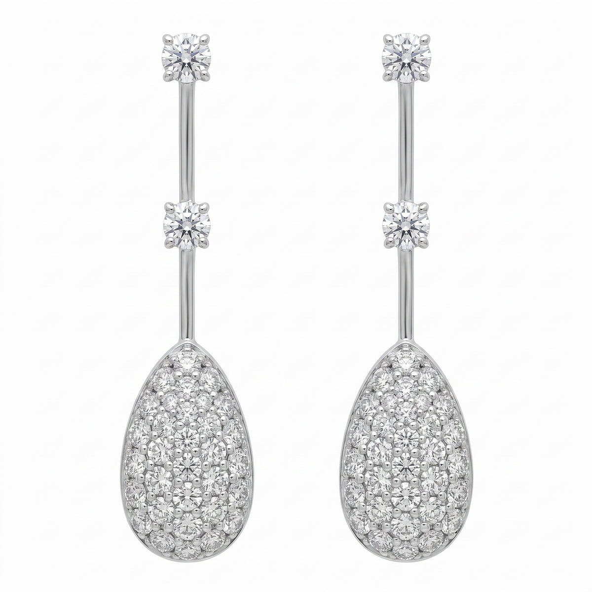 Pave pear drop diamond dangle earrings in 18K white gold, studio white background