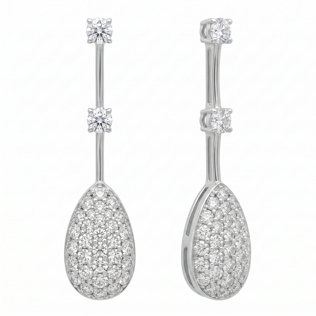 Pave pear drop diamond dangle earrings in 18K white gold, second studio view showing the drop in profile