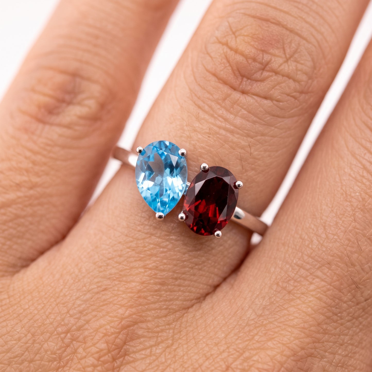 Oval Garnet & Pear Blue Topaz Ring