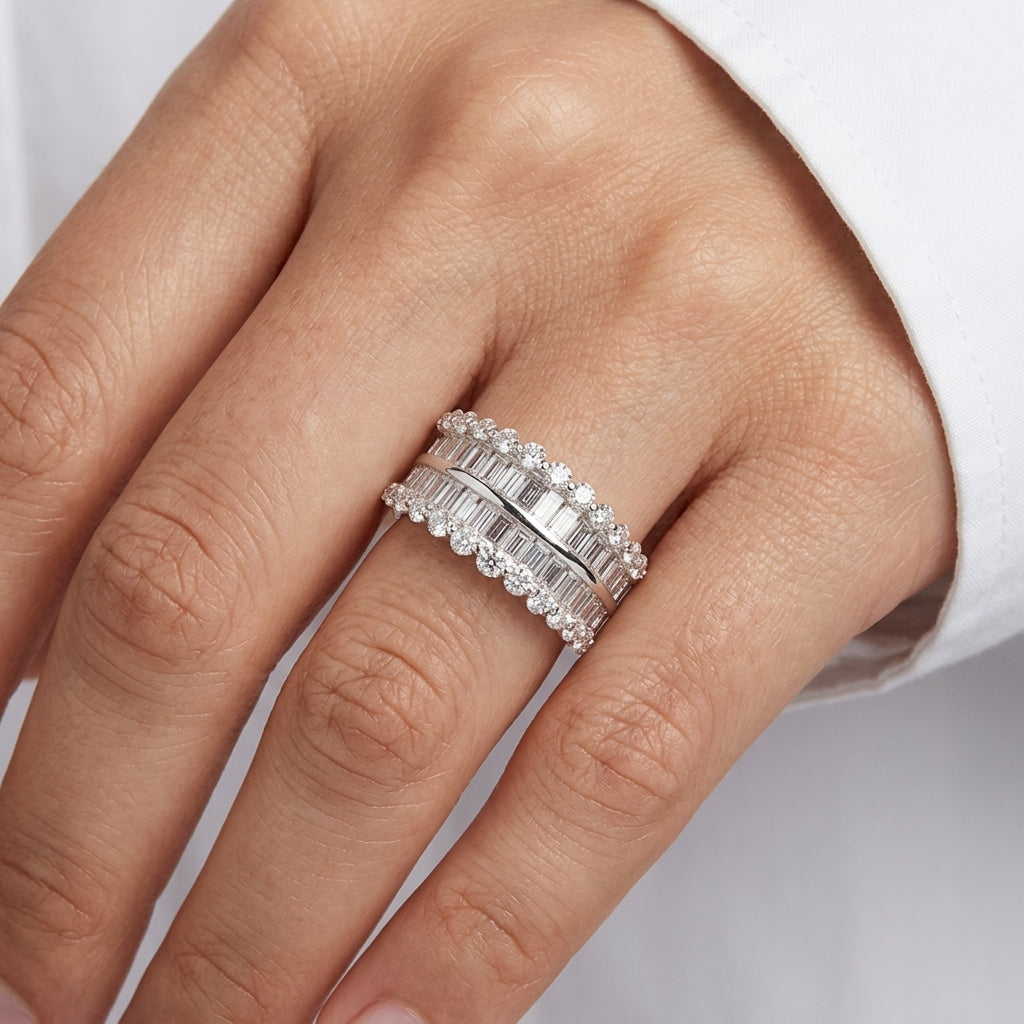 Model wearing 18K white gold baguette and round diamond band ring