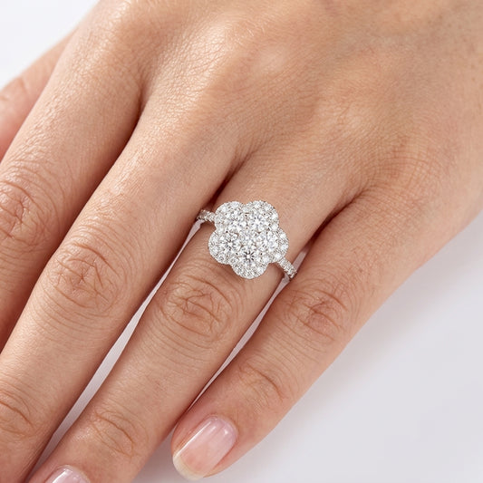Model wearing 18K white gold diamond flower cluster ring