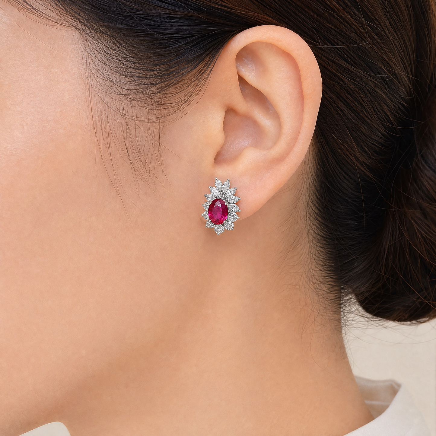 1REEJ394BW model shot - oval ruby and marquise diamond crown clip earring worn on ear