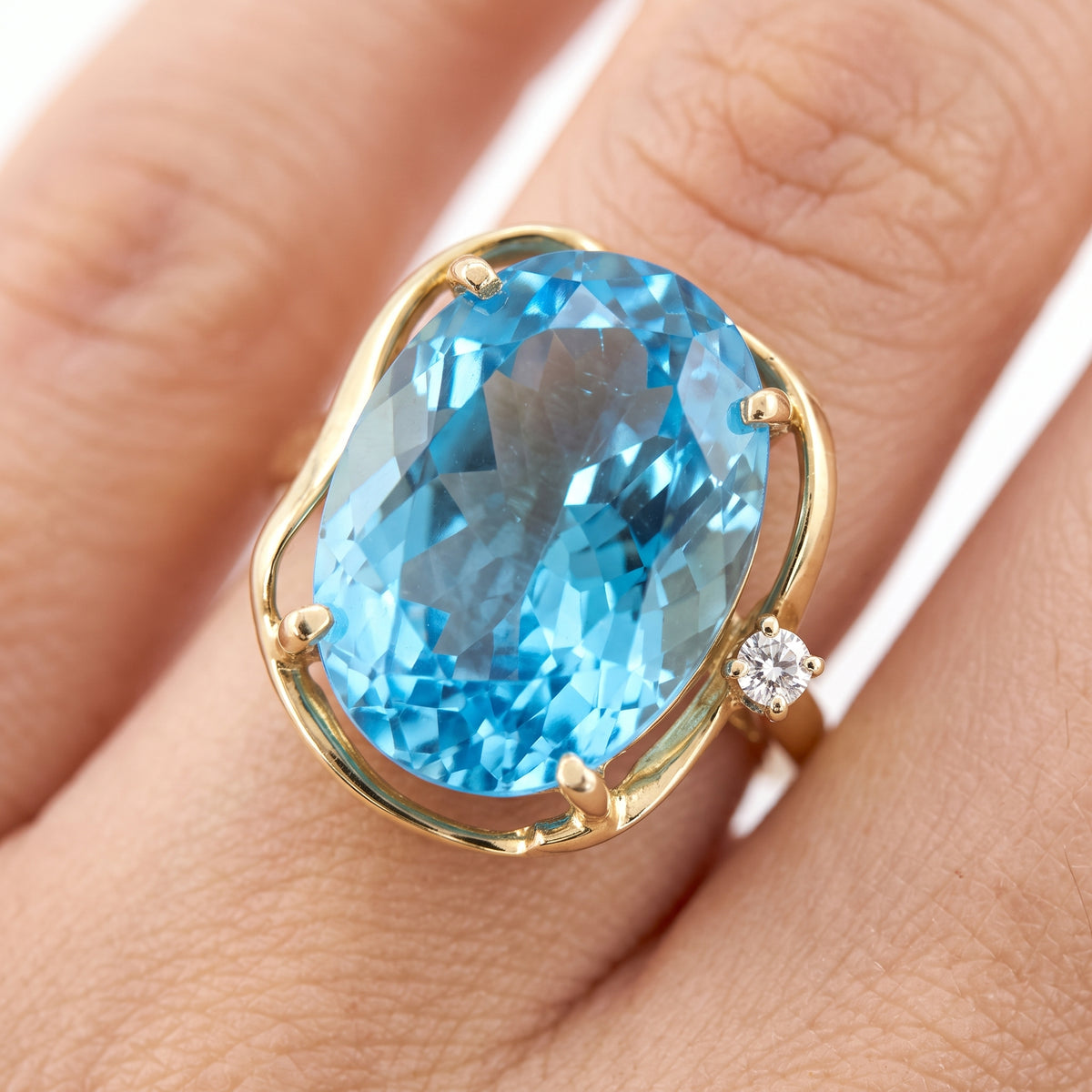 13x18mm Oval Blue Topaz & 1-Diamond Free-Form Ring