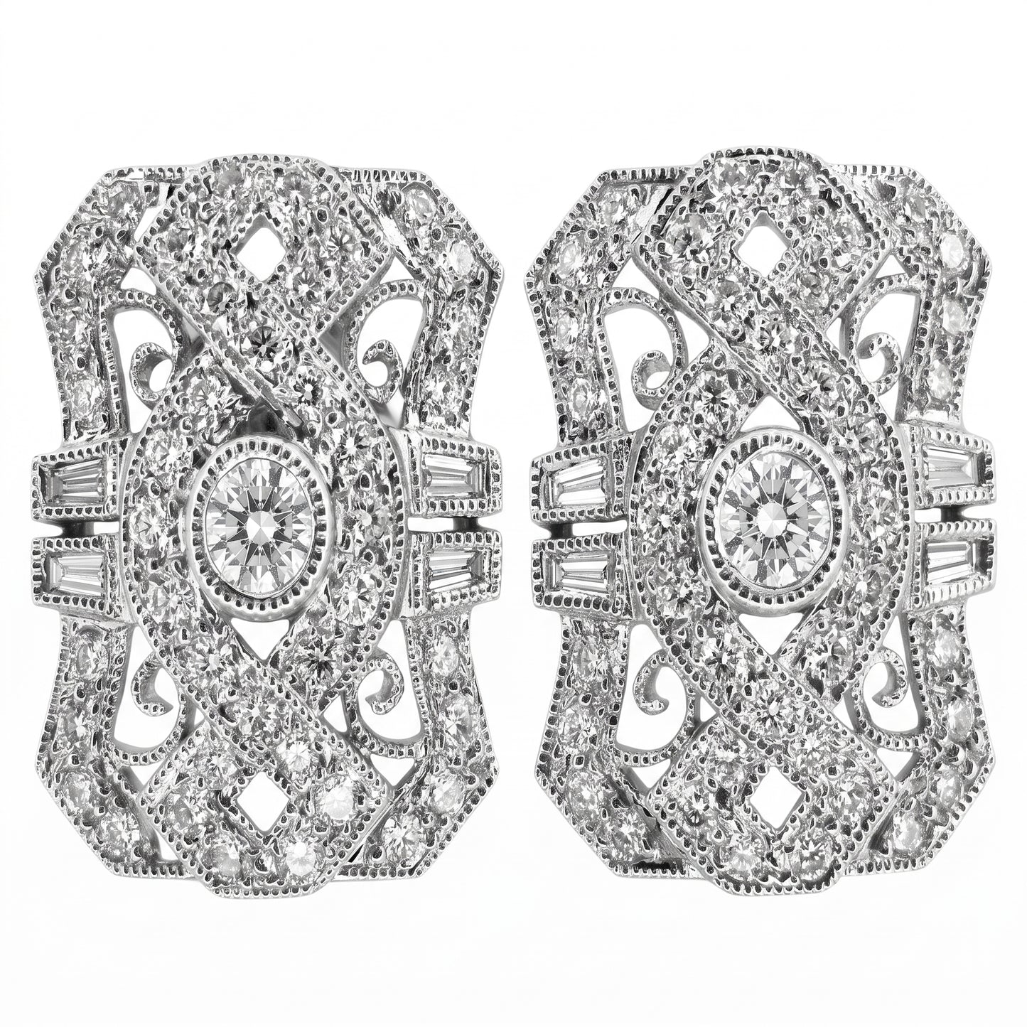 DECY0280W W-1 frontal pair - Art Deco shield-shaped filigree clip earrings with pinched concave sides and milgrain edging, a round brilliant centre diamond in a milgrain bezel collet, four tapered baguettes per earring set two either side of the waist, and pave round diamonds across pierced C-scroll filigree, in 18K white gold