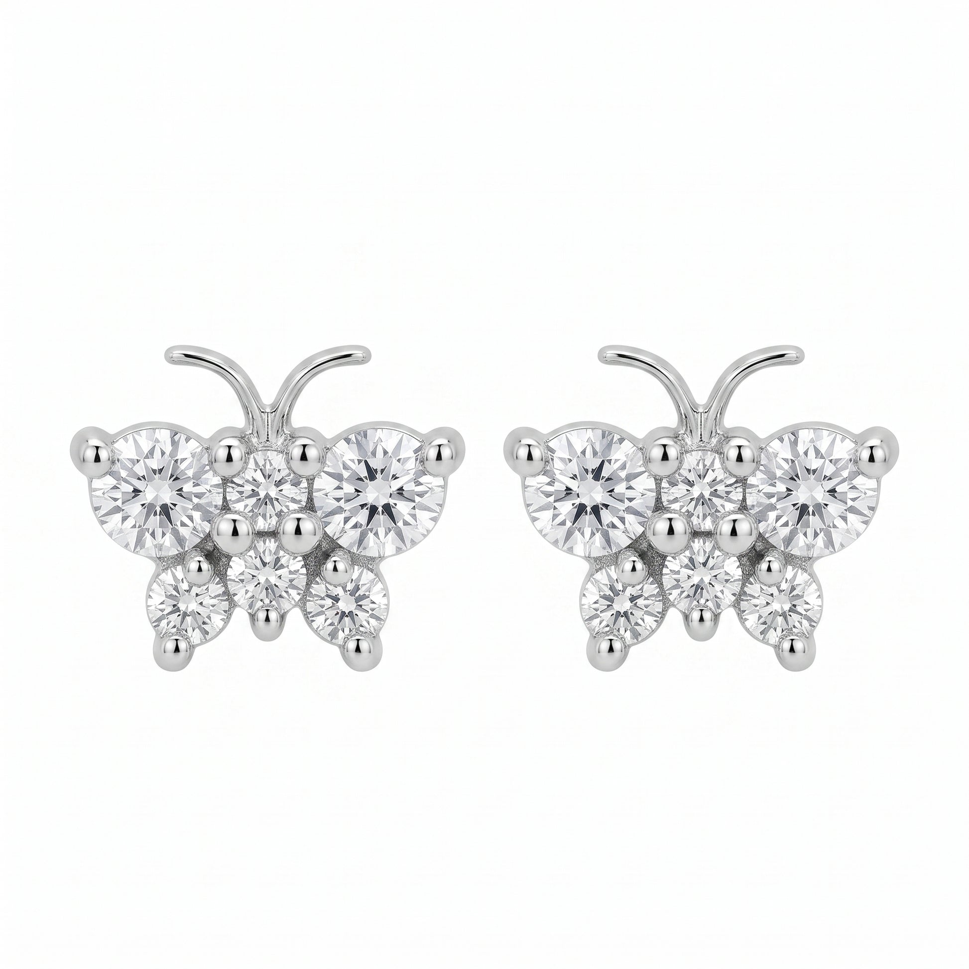 18K white gold butterfly stud earrings with round brilliant diamonds, pair, white background