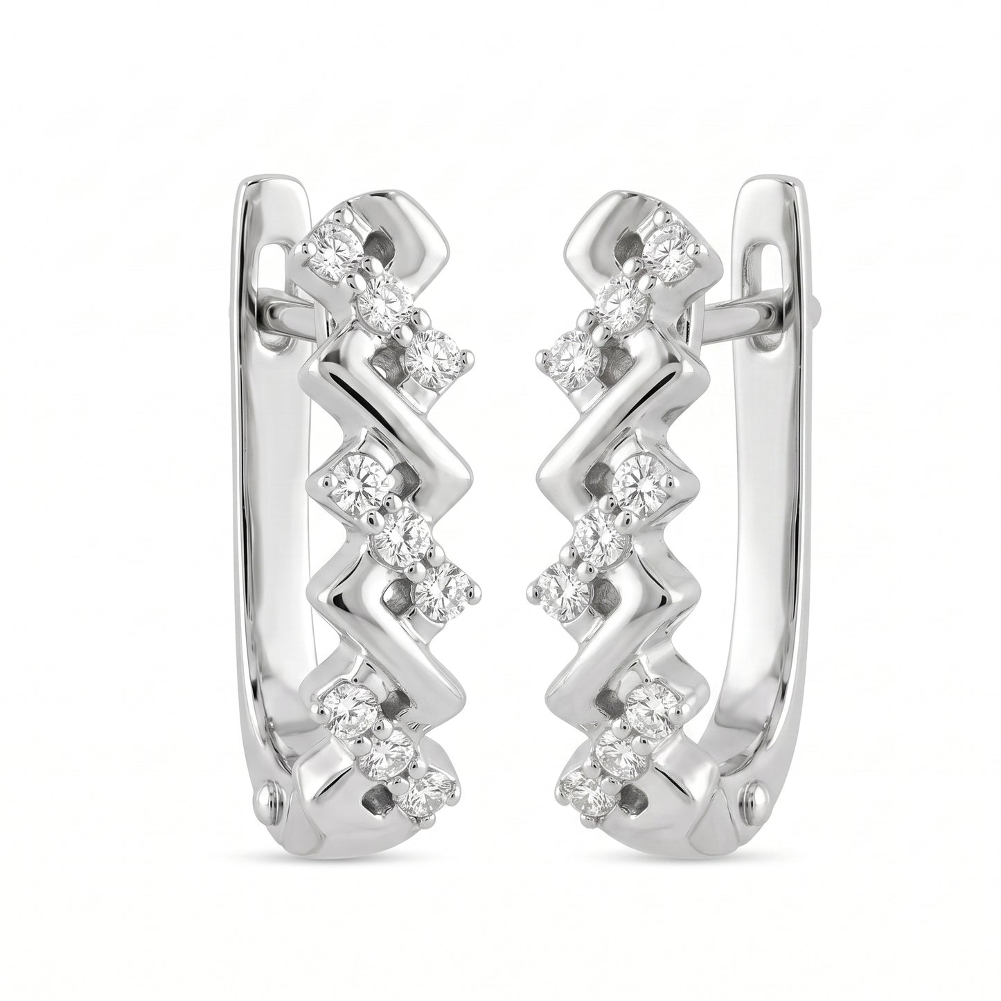 DEFT0618W 14K white gold zigzag chevron huggie hoop earrings with prong-set round diamonds, angled view