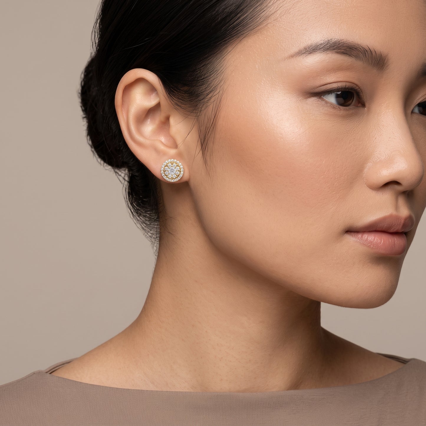 Model wearing 54-Diamond Double-Halo Stud Earring in 14K yellow gold