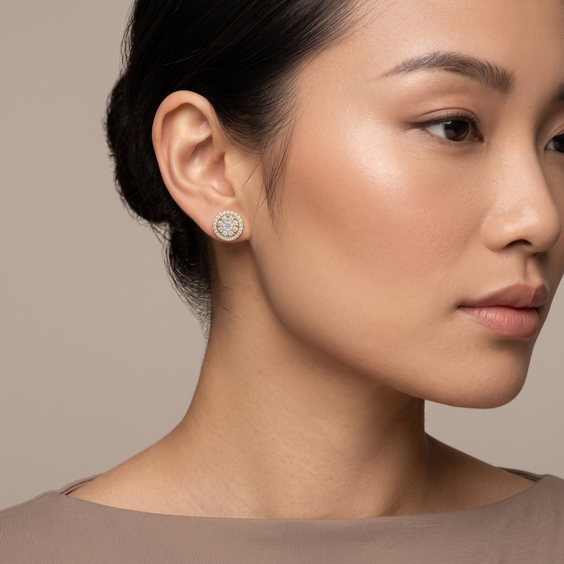 Model wearing 54-Diamond Double-Halo Stud Earring in 14K yellow gold