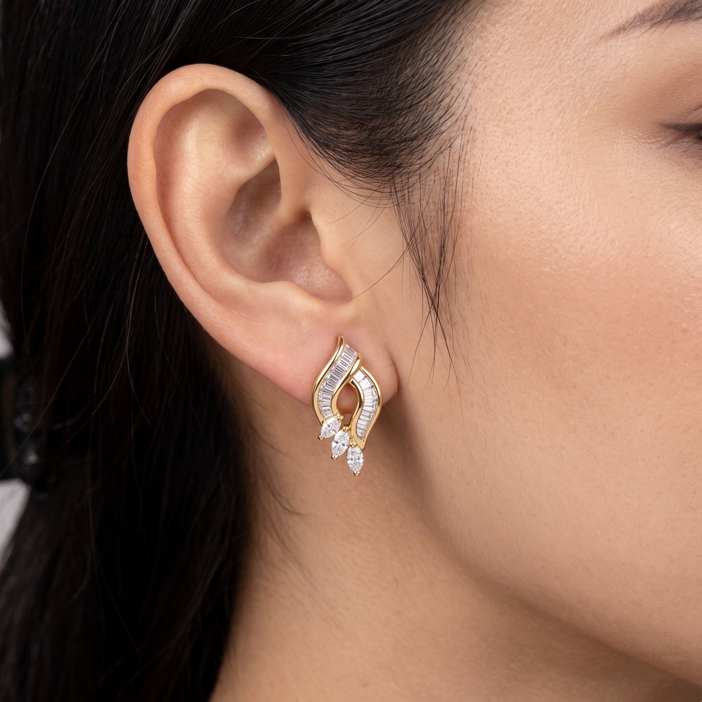 49 Tapered & Marquise Diamond Stud Earrings - worn on model, 18K yellow gold flame-shaped tapered baguette and marquise diamond stud