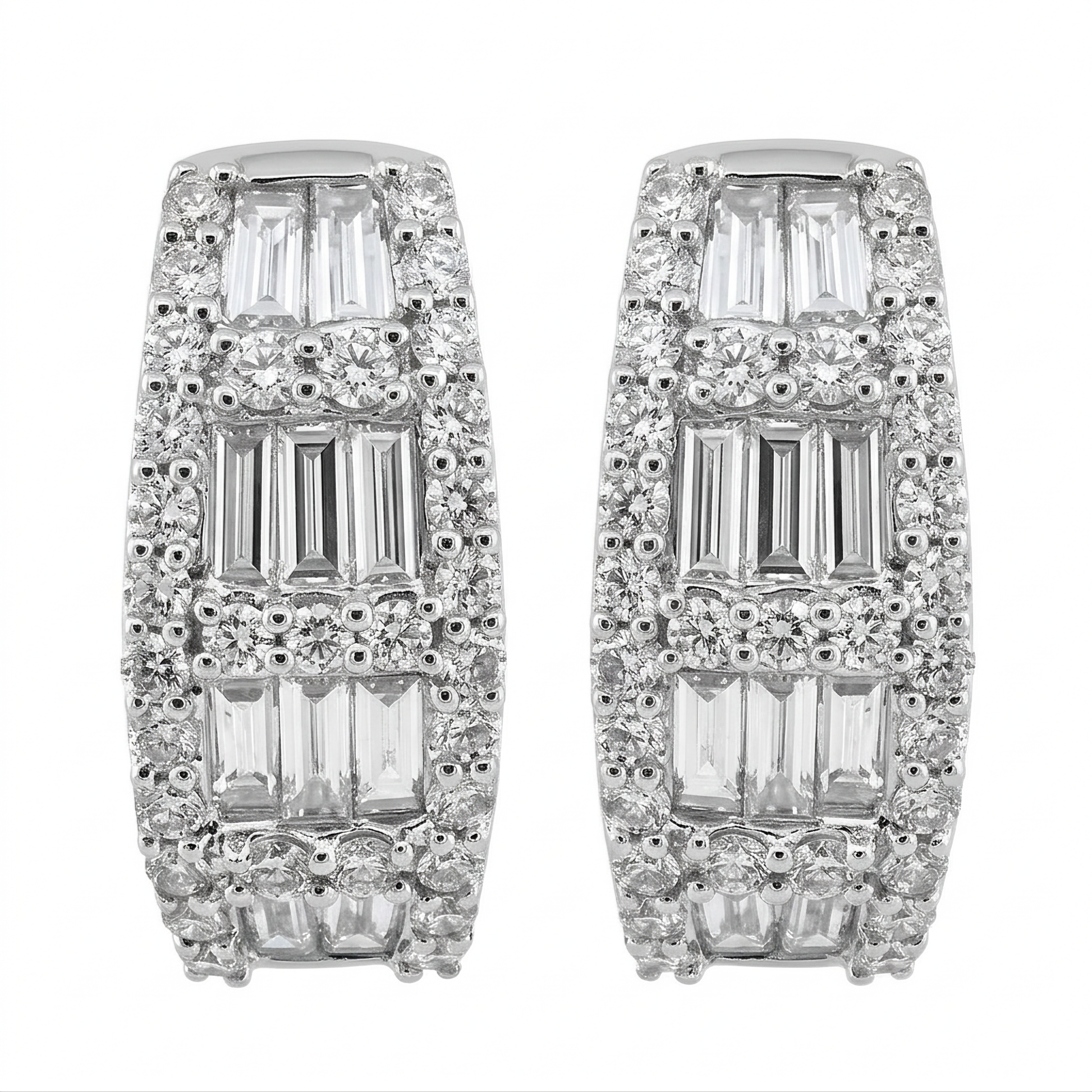 18K white gold baguette and round diamond huggie hoop earrings on a white background