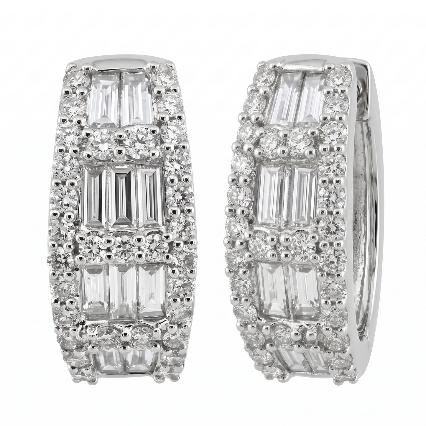 18K white gold baguette and round diamond huggie hoop earrings, angled view showing the hinge and plain inner band, on a white background