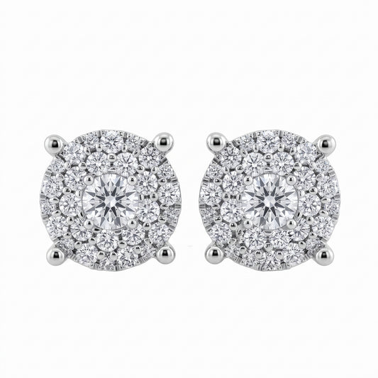 56-Diamond Round Stud Earrings, 7.5mm - 18K white gold round paved illusion cluster with one centre round brilliant, a ring of six medium round brilliants and outer rings of smaller round diamonds, four diagonal claw prongs