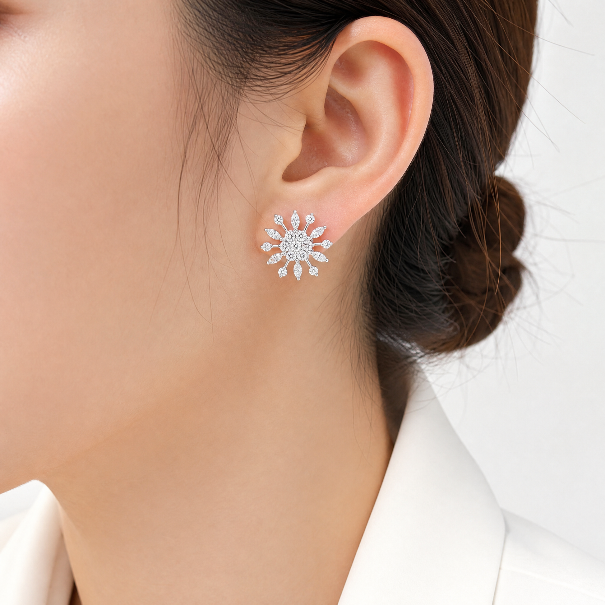 DERT0453W model shot - marquise and round diamond snowflake stud earring worn on ear