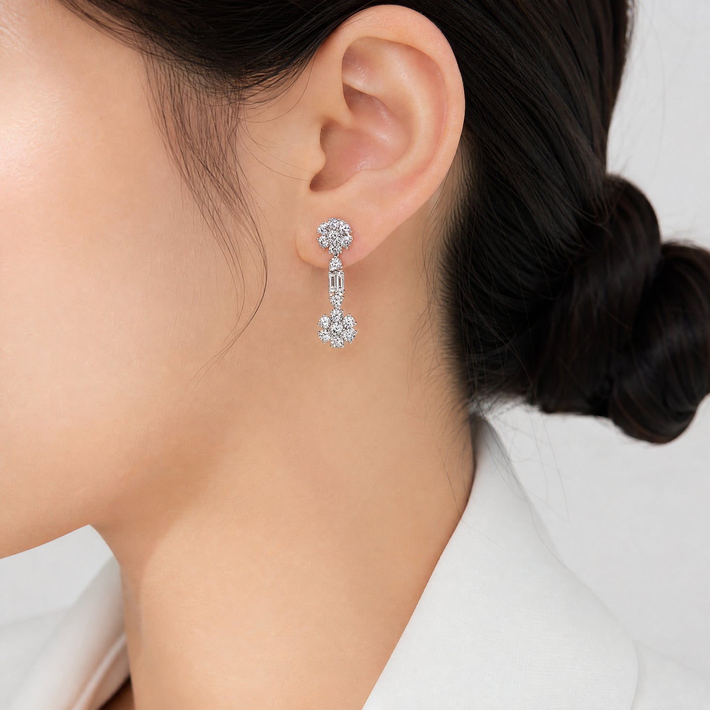 DERT0471W model shot worn on ear diamond flower cluster dangle earring