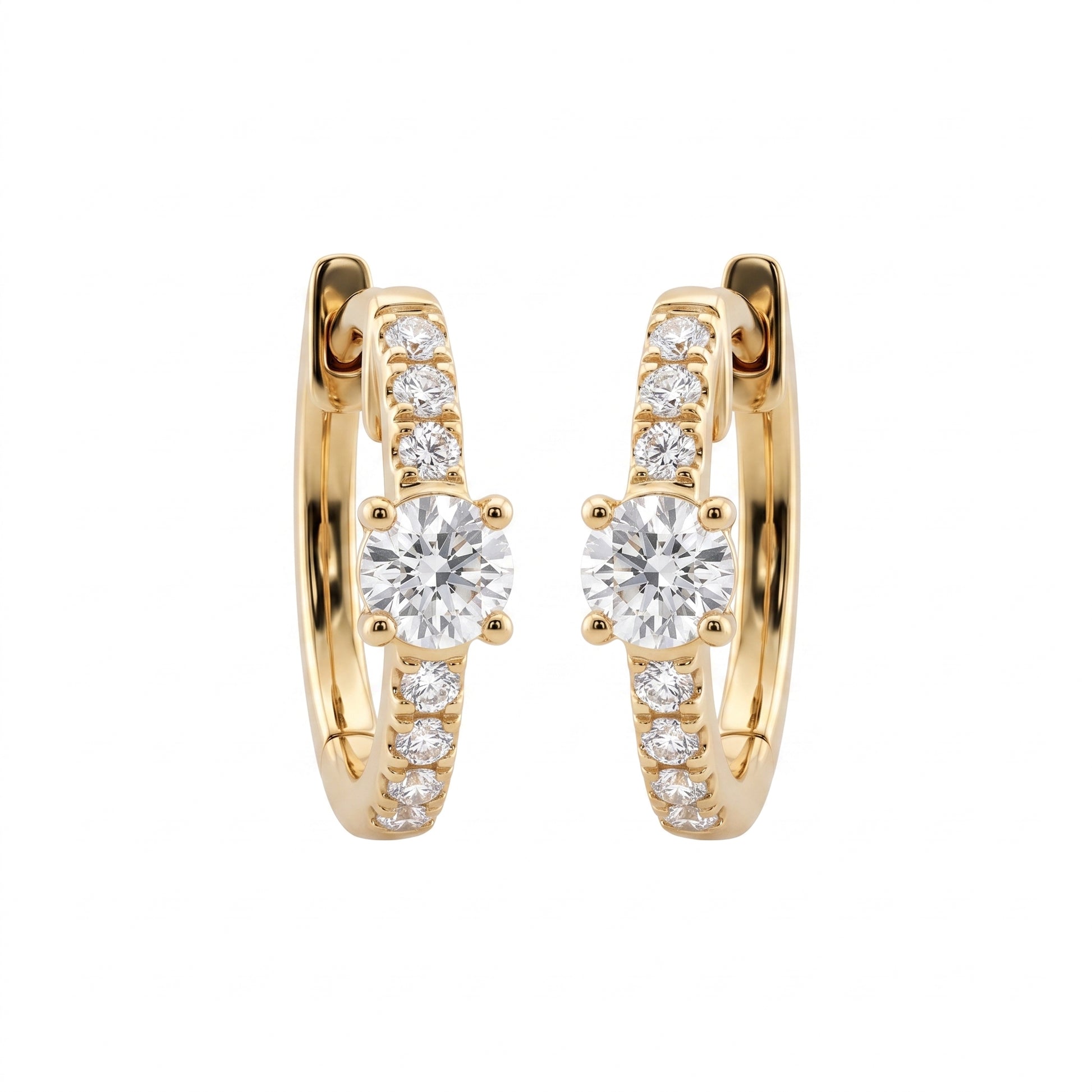 DERT0954 14K yellow gold hinged huggie hoop earrings with round brilliant centre stone and seven-diamond graduated row, front view