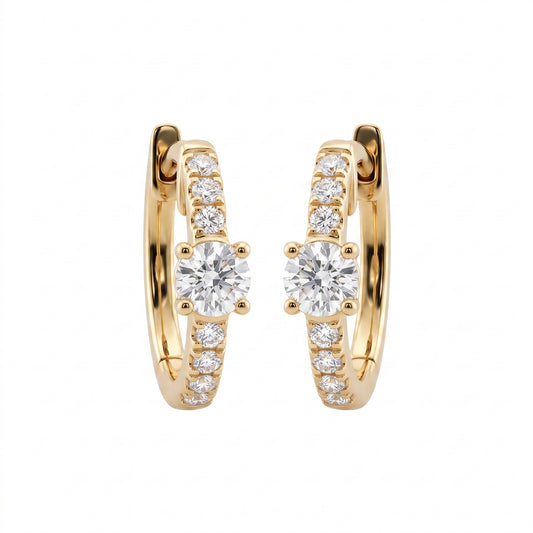 DERT0954 14K yellow gold hinged huggie hoop earrings with round brilliant centre stone and seven-diamond graduated row, front view
