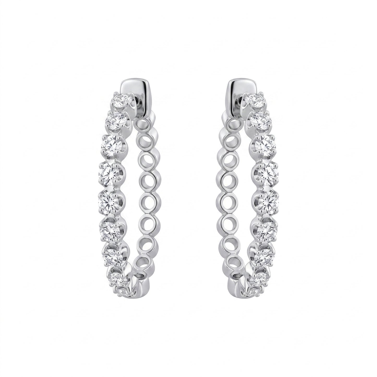 16-Diamond Oval Hoop Clip Earrings - 18k white gold oval hoops prong-set with a single row of round diamonds along the front arc of each earring