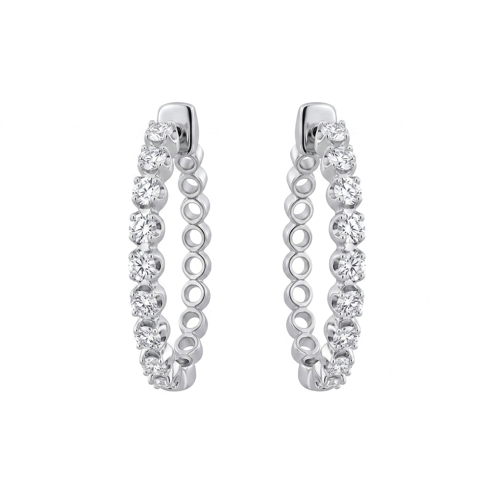 16-Diamond Oval Hoop Clip Earrings - 18k white gold oval hoops prong-set with a single row of round diamonds along the front arc of each earring