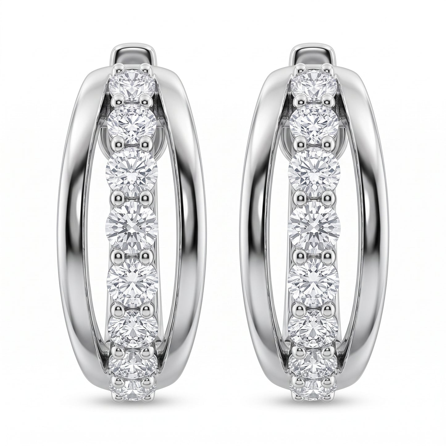 18-Diamond Oval Hoop Earrings - 14k white gold oval huggie hoops bead-set with 9 round diamonds along the front arc of each earring