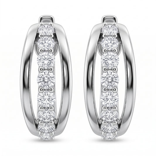 18-Diamond Oval Hoop Earrings - 14k white gold oval huggie hoops bead-set with 9 round diamonds along the front arc of each earring
