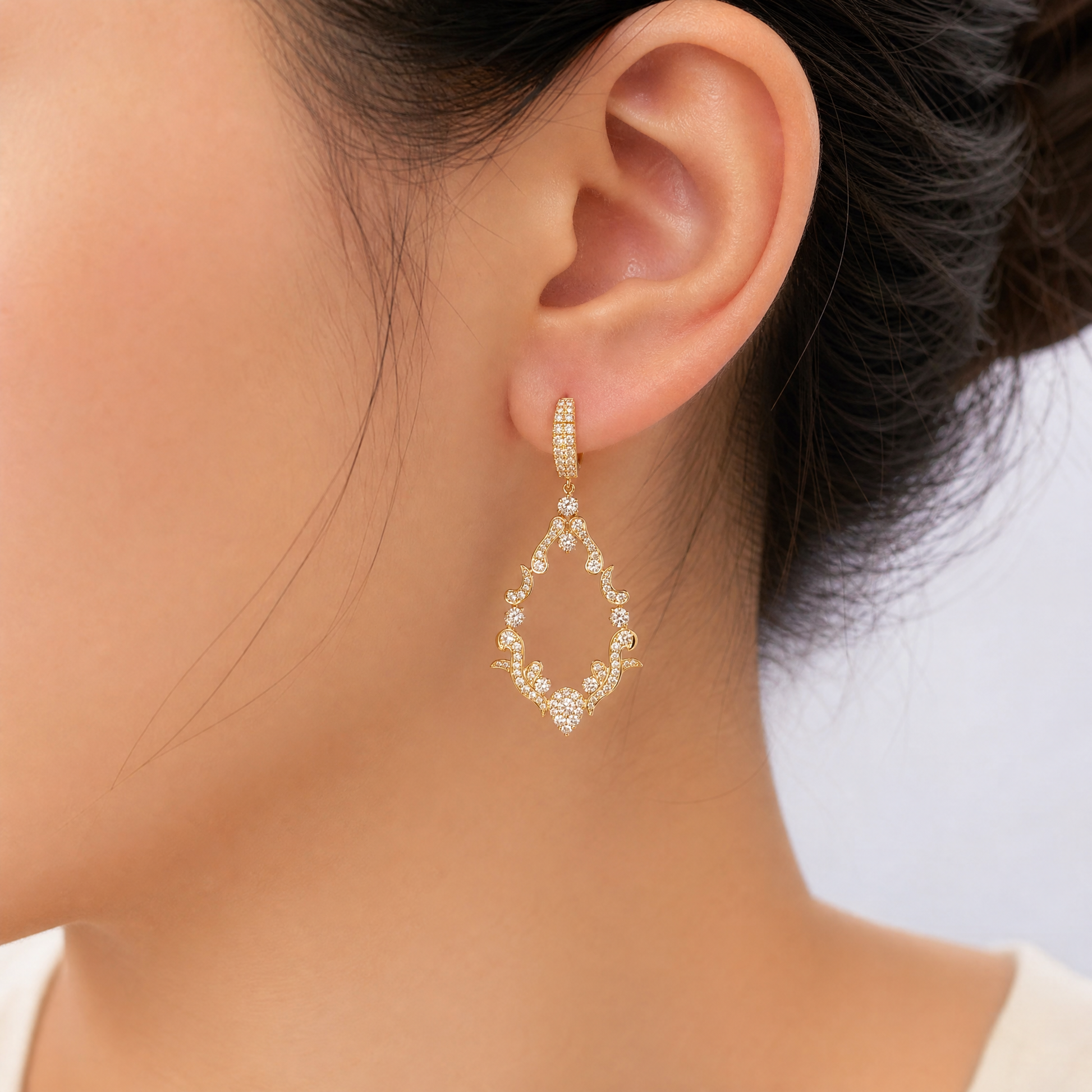 DESD0082 model shot - diamond openwork arabesque filigree drop earring worn on ear