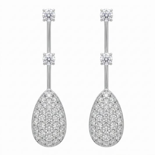 Pave pear drop diamond dangle earrings in 18K white gold, studio white background