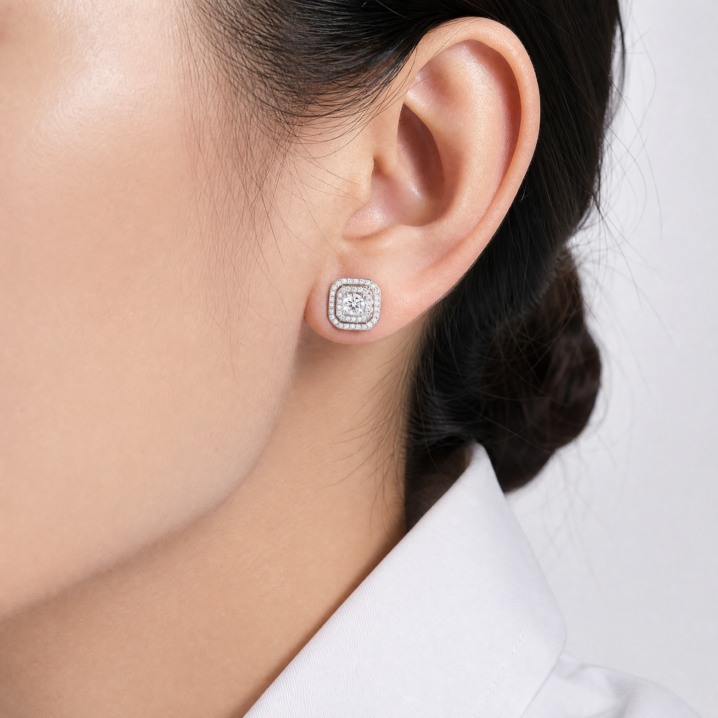 DETE0273W model shot - round diamond double cushion-halo stud earring worn on ear