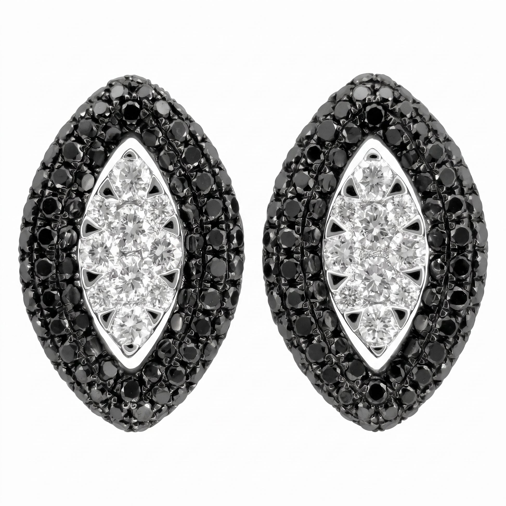 14K white gold black and white diamond marquise stud earrings on a white background