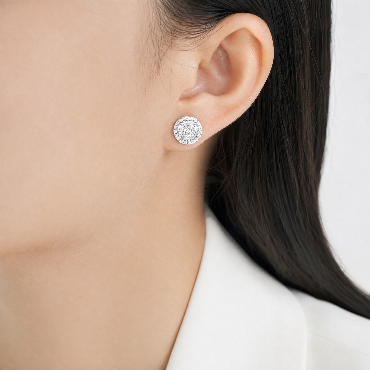 DETE0610W model shot - round diamond cluster disc stud earring worn on ear