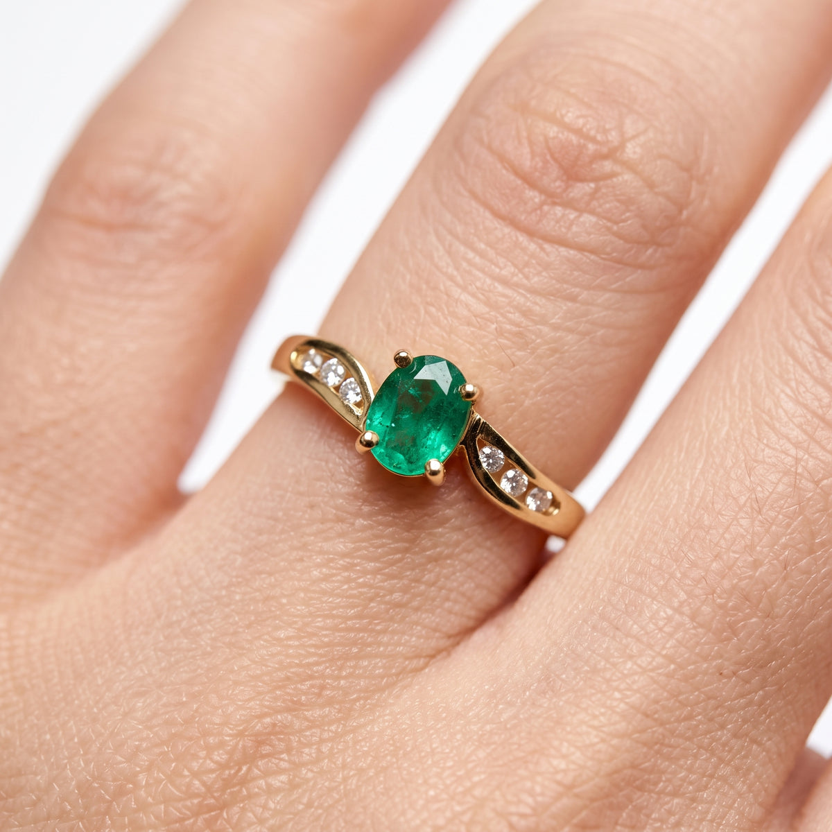4x5mm Oval Emerald & 6-Diamond Ring