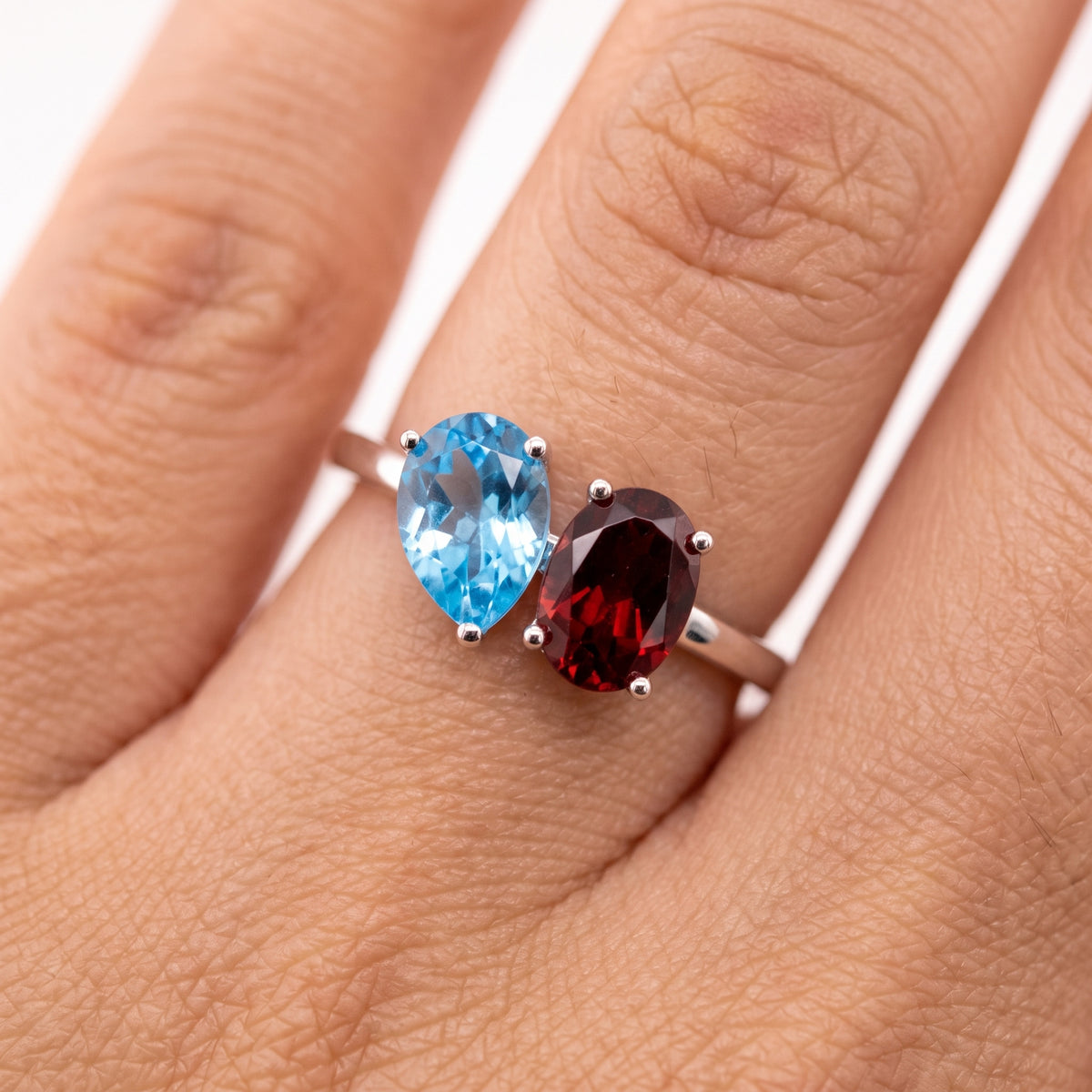 Oval Garnet & Pear Blue Topaz Ring