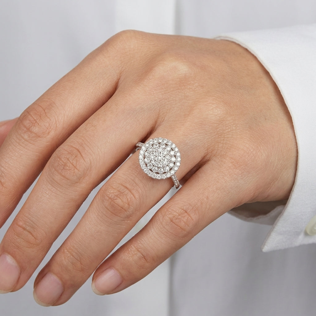 Model wearing 18K white gold diamond pave cluster ring