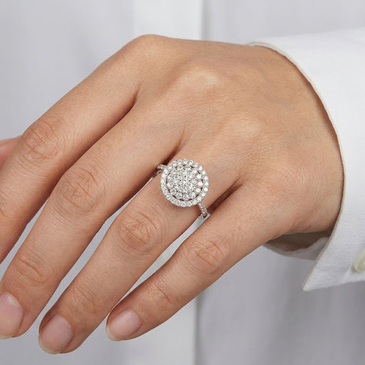 Model wearing 18K white gold diamond pave cluster ring
