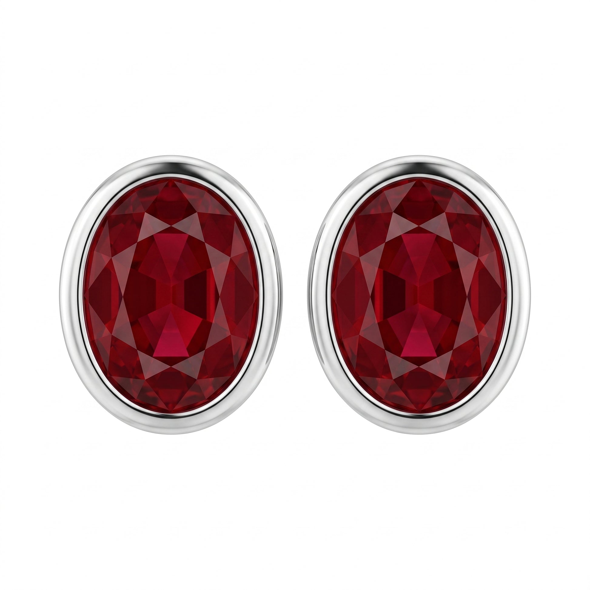 14k and 18k white gold 5x6mm oval ruby bezel-set earrings, white background