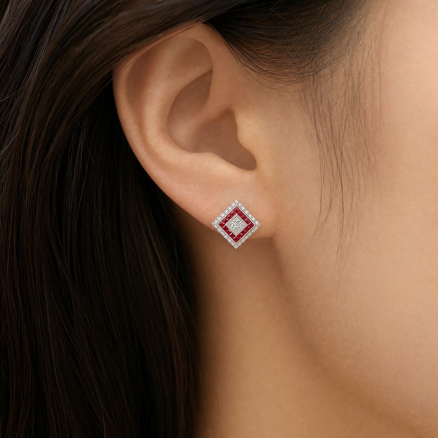 RERT0432W model shot - Art Deco square-on-point ruby and diamond white gold clip earring worn on ear