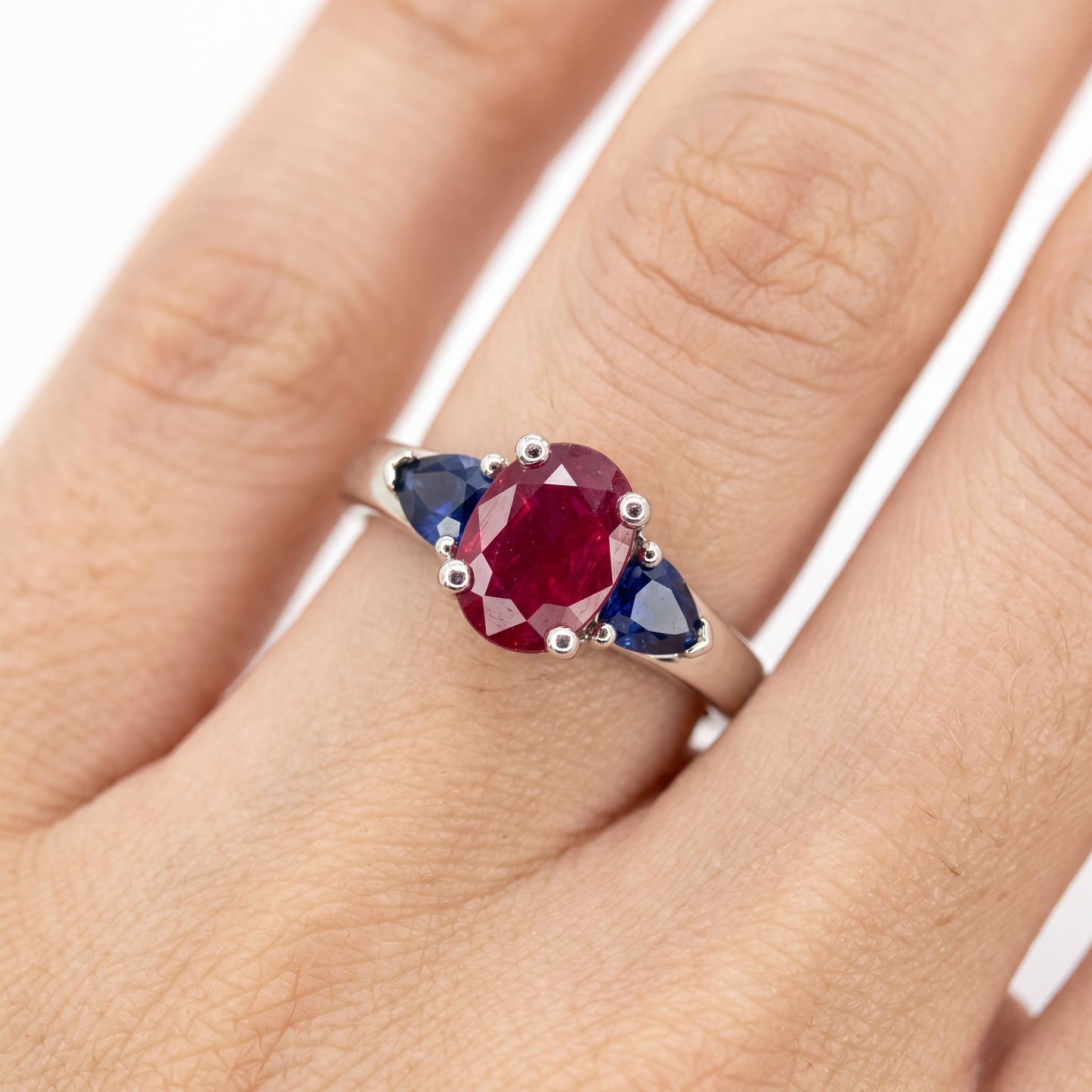 5x7mm Oval Ruby & 2 Pear-Cut Sapphire Ring