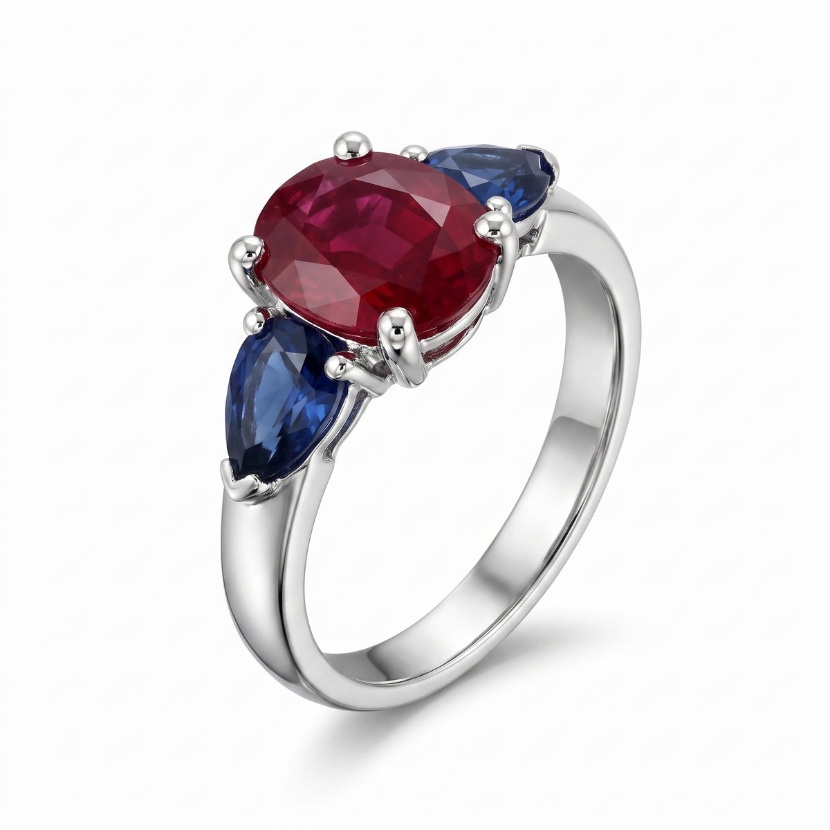 5x7mm Oval Ruby & 2 Pear-Cut Sapphire Ring