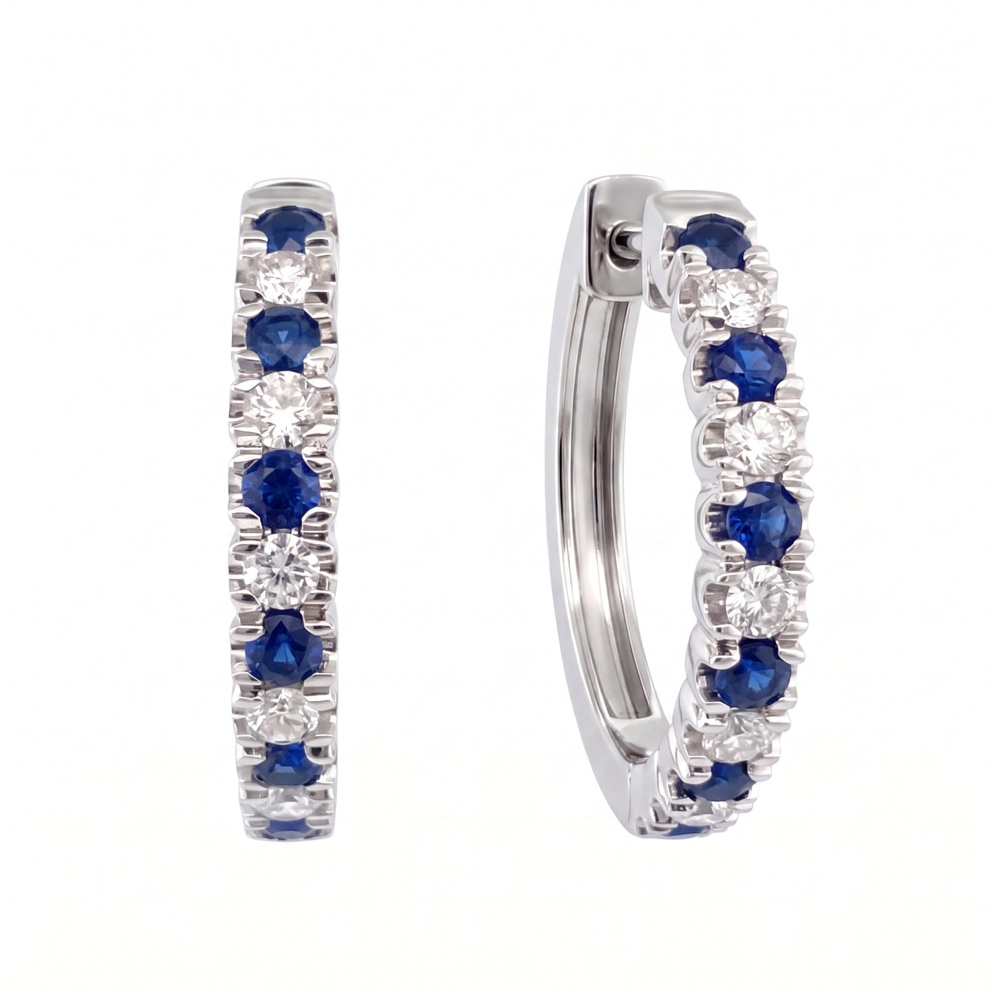 18K white gold inside-out hoop earrings with alternating blue sapphires and diamonds, angled view on a white background