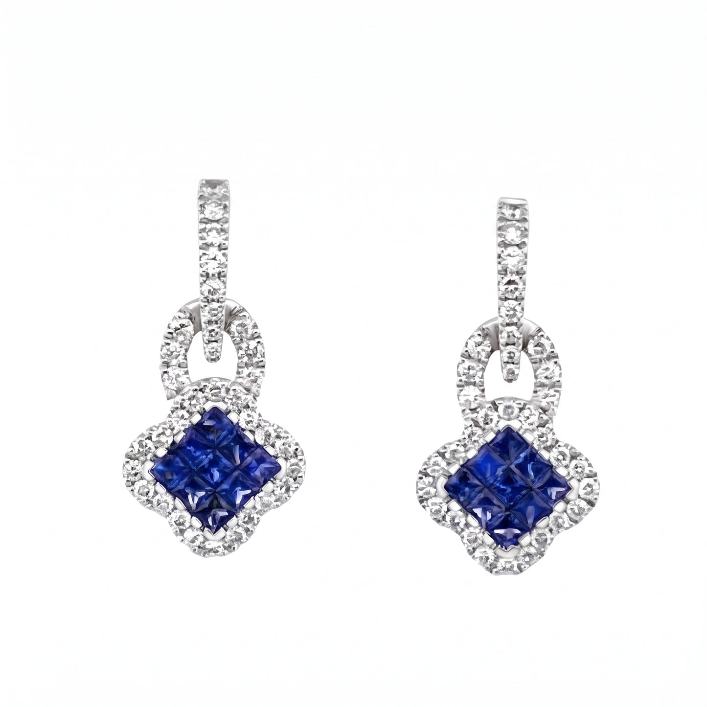 18k white gold eighteen square blue sapphire and round diamond quatrefoil dangle post earrings, white background
