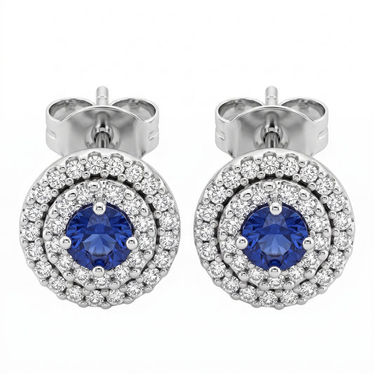 SEPL0049W 14K white gold double-halo post earrings with a round blue sapphire centre and two rows of pave diamonds, white background