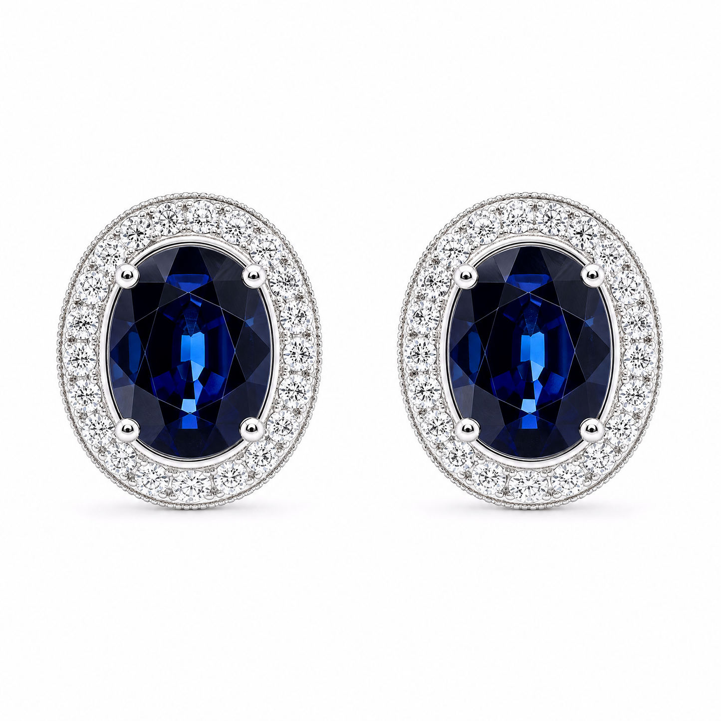 SERT0502W-OV W-1 frontal pair - oval blue sapphire with milgrain diamond halo stud earrings in 18K white gold