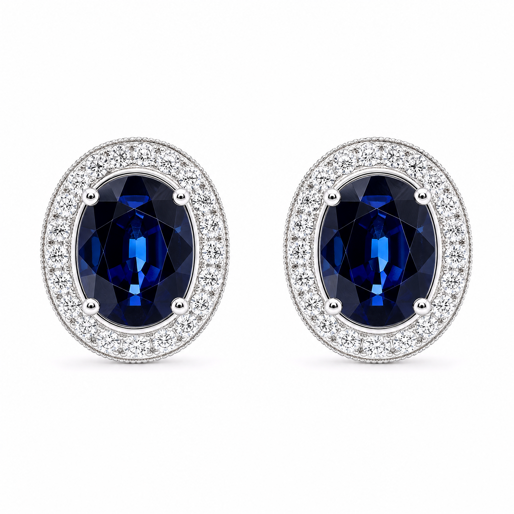 SERT0502W-OV W-1 frontal pair - oval blue sapphire with milgrain diamond halo stud earrings in 18K white gold