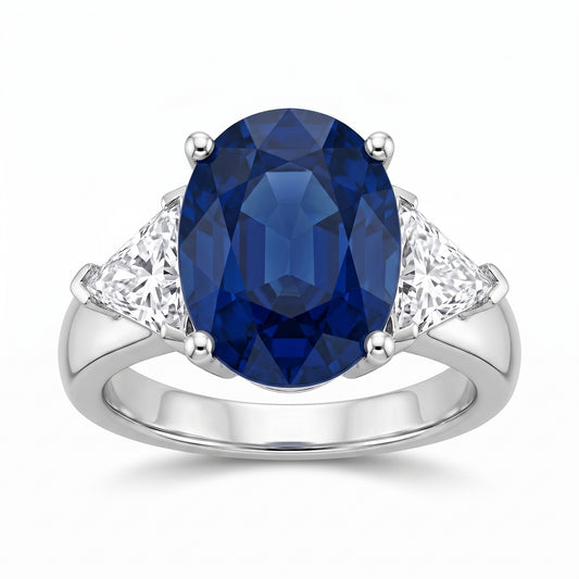 4.62ct Oval Sapphire Three-Stone Ring with Trillion Diamonds